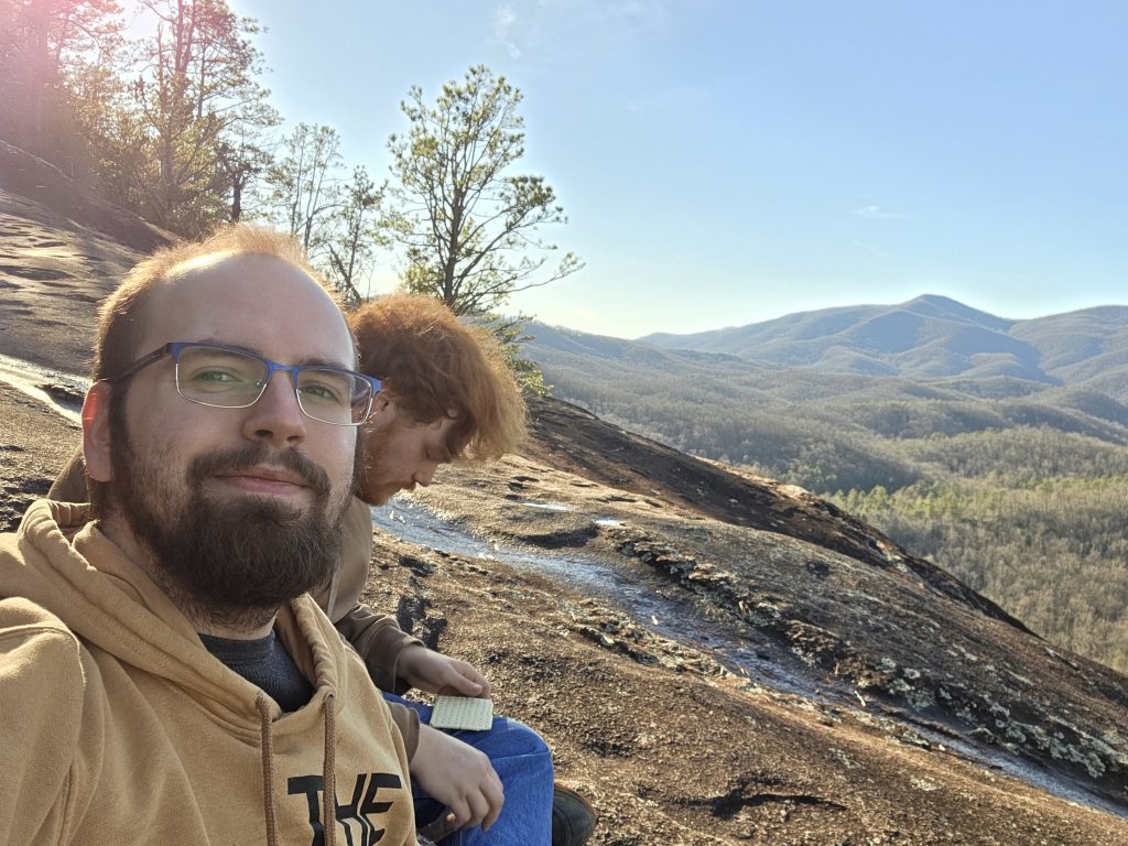 Me and Rylan eating stale MREs on the John Rock view.